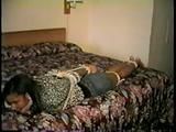 18 Yr OLD BLACK COLLEGE STUDENT IS MOUTH STUFFED, CLEAVE GAGGED, HOG-TIED, BAREFOOT, TOE-TIED, HOPS AROUND ROOM, TRIES MAKING PHONE CALL AND IS HANDGAGGED (D61-2)
