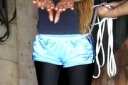 Katharina tied and gagged in shiny nylon shorts