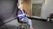 Alice bound and gagged in a shiny nylon Downjacket
