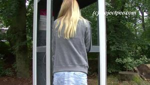 080004 Nikki Takes A Very Daring Pee In A Phone Box.