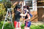 Jill tied and gagged by her friend in shiny nylon shorts