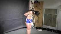 Watch Marie bound and gagged in a shiny nylon Shorts