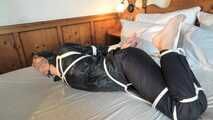 Rachel Adams tied and gagged in Rainwear