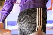 Mara during her workout wearing a sexy silber leggings and a nlack shiny nylon shorts over it as well as a purple rain jacket (Pics)
