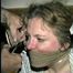 30 Yr OLD SINGLE MOM GETS PANTIES STUFFED IN HER MOUTH, TIGHTLY WRAP TAPE GAGGED AND TIED UP ON THE BED (D49-7)