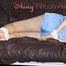 ***NEW MODELL MIA*** wearing a sexy lightblue shiny nylon shorts and a top being tied and gagged with ropes and a clothgag on a bed (Pics)