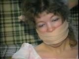 25 YR OLD CHARLENE HAS RAG & SPONGE STUFFED IN MOUTH, CLEAVE & ACE BANDAGE GAGGED, BLINDFOLDED & BALL-TIED (D39-2)