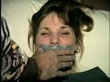 26 Yr OLD BARMAID IS BOUND, MOUTH STUFFED, HANDGAGGED & TAPE GAGGED (D27-2)