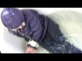 03:00 Min. video with Nina tied and gagged in a shiny nylon downjacket