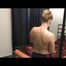 Jenny preparing her bed and lolling in bed wearing sexy purple shiny nylon rainwear (Video)
