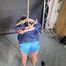 Lena buttplugged, bound and gagged in shiny Shorts and Windbreaker