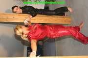 Get 277 Pictures with Michelle and Jill tied and gagged in shiny nylon rainwear from 2005-2008!