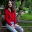 The girl who has given up smoking is giving an interview smoking