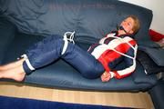 Katharina tied and gagged in a skisuit