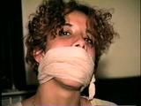 LATINA MARIA IS BALL-GAGGED, HANDCUFFED, HANDGAGGED, PANTY STUFFED & CLEAVE & OTM GAGGED WITH ACE BANDAGE (D34-14)
