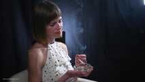 34 years old lady is smoking cork 100mm cigarette