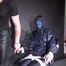 Watching sexy Aiyana being tied, gagged, dominated and hooded from dark temptation wearing sexy shiny nylon rainwear (Video)