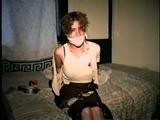 LATINA MARIA IS BALL-GAGGED, HANDCUFFED, HANDGAGGED, PANTY STUFFED & CLEAVE & OTM GAGGED WITH ACE BANDAGE (D34-14)