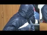 03:20 Min. video with Jill tied and gagged in shiny nylon rainwear