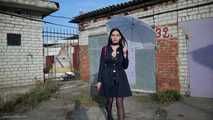 Attractive Lera taking a smoke break outside