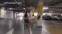 078055 Rachel Evans Takes A Risky Pee In The Parking Garage