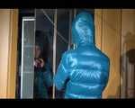 SONJA in high heels wearing a sexy white shiny nylon skirt and a green down jacket posing infront of the mirror (Video)