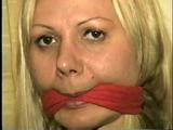 29 Yr OLD SEXY ROMANIAN TAPES AND CLEAVE GAGS HERSELF, HOPS AROUND THE ROOM BAREFOOT & IS CLEAVE GAGGED 3 MORE TIMES (D53-12)