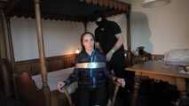 Rachel Adams bound, pantygagged and pantyhooded in shiny nylon Rainwear