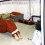 Shelly tied and gagged in shiny nylon rainwear