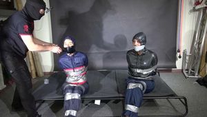 Aiyana and Ms Ungeniert bound and gagged in shiny nylon Rainwear