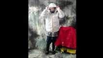 Nadja posing in layers of raingear part 2