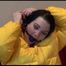 Jill ties, gagges and hoodes herself wearing a shiny yellow down jacket and a yellow rain pants(Video)