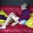 Watching sexy Sonja wearing ONLY a sexy lightblue shiny nylon shorts lolling on the bed (Video)