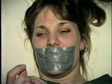 26 Yr OLD BARMAID IS BOUND, MOUTH STUFFED, HANDGAGGED & TAPE GAGGED (D27-2)
