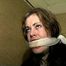 26 YEAR OLD RIVER IS BALL-GAGGED, WIDE EYED DROOLING, MOUTH STUFFED, CLEAVE GAGGED, OTM GAGGED & HANDGAGGED (D66-16)