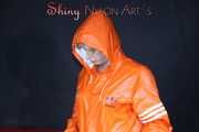 Watching Pia putting on a wonderful supersexy shiny nylon rainssuit in orange (Pics)