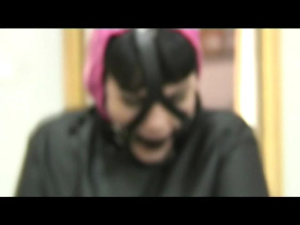 0310 Min Video With Jill In Straight Jacket And Harnes Gagged In Shiny Nylon Shorts