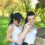 Jill and her friend having fun together outdoor both wearing shiny nylon shorts and a top (Pics)