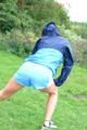 Enni wearing sexy blue shiny nylon shorts and rainjacket during her warm-up (Pics)