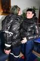 Petra was tied by Jill in shiny downjackets 