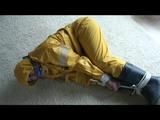 03:20 Min. video with Katharina bound in a yellow rainsuit