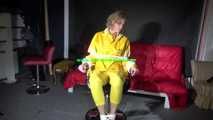 Sexy Pia being tied and gagged on a chair wearing sexy shiny nylon rainwear (Video)