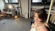 Watch Marie bound and gagged in a shiny nylon Shorts