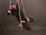 Get 4 classic videos with Lupi wearing shiny nylon rainwear beeing tied and gagged