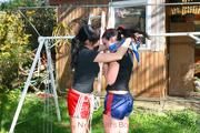 Jill tied and gagged by her friend in shiny nylon shorts