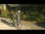 Enni riding the bicycle wearing a sexy shiny nylon shorts beneath the jeans and a downjacket on naked skin (Video)