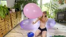 topless inflating balloons with the pump and popping them with the lighter