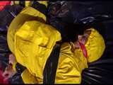 Get 2 Archivevideos with sonja enjoying Bondage in her shiny nylon Rainwear