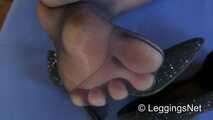 Füße und Beine in Nylons