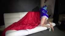 Sexy Sonja preparing her bed wearing sexy shiny nylon shorts and a long rain jacket (Video)